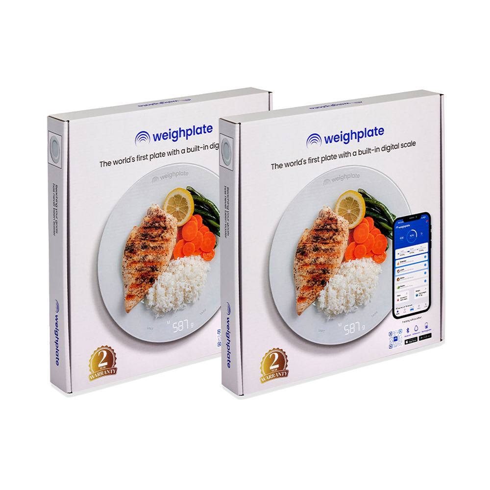 Two white Weighplate smart plates in packaging box for automatic calorie and macro tracking
